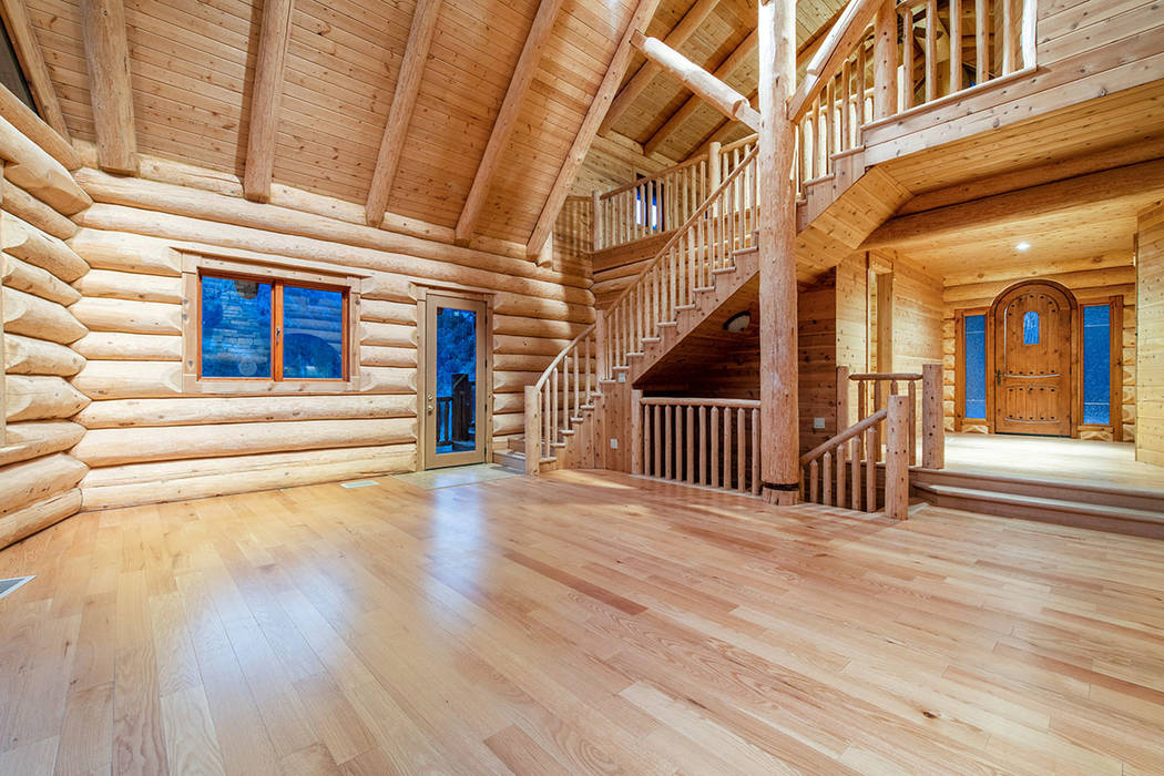 The owner purchased hand-hewn Douglas Fir logs from a craftsman in Canada. (Berkshire Hathaway ...