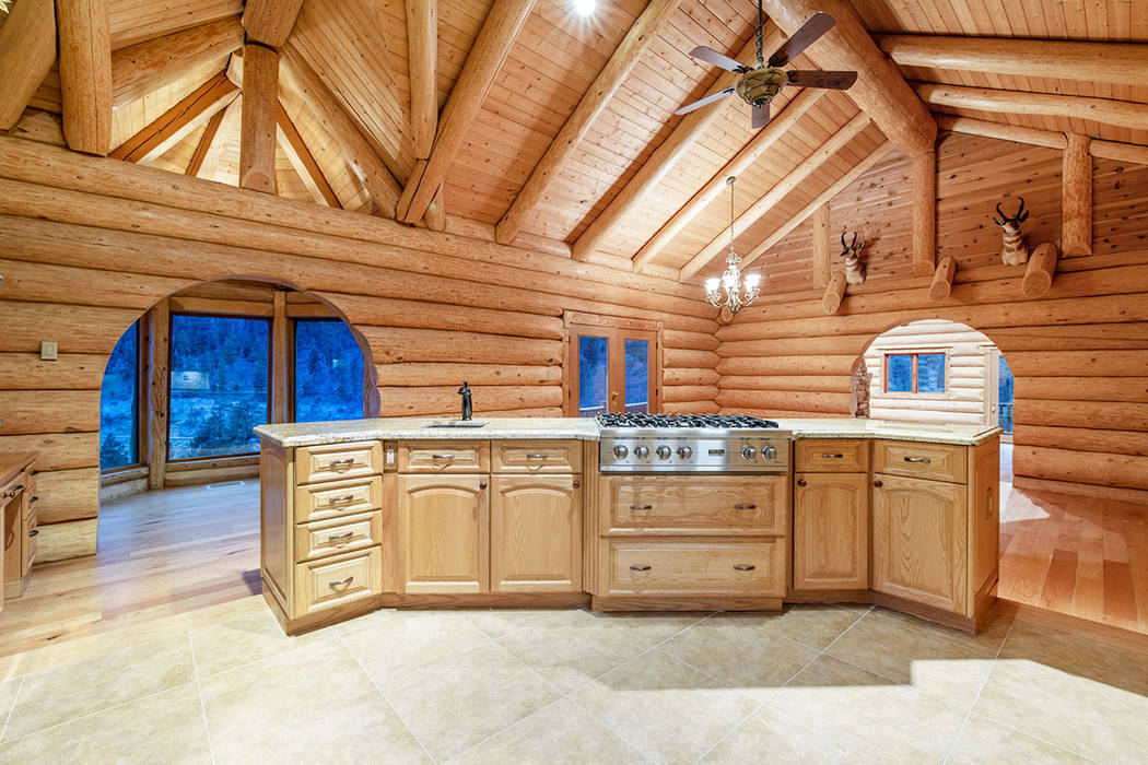 The kitchen is complete with professional-grade Viking appliances. (Berkshire Hathaway Home Se ...