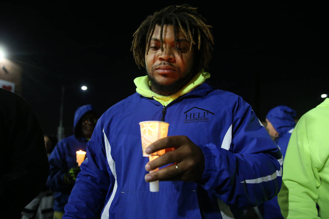 Scott Richardson, worker for HELP of Southern Nevada, participates during a candlelight vigil t ...