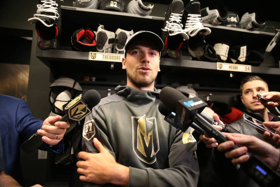 Vegas Golden Knights defenseman Shea Theodore (27) speaks to reporters at City National Arena i ...