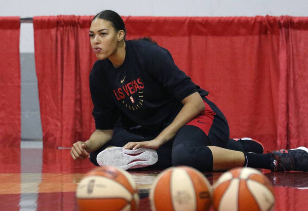 Las Vegas Aces' Liz Cambage stretches during team practice at Cox Pavillion on Friday, Aug. 30 ...