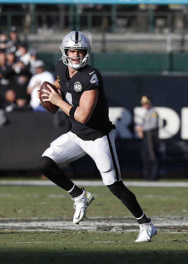 Oakland Raiders quarterback Derek Carr (4) against the Tennessee Titans during an NFL football ...