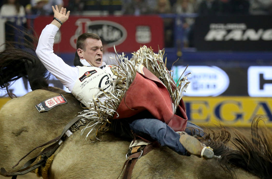 Tim O'Connell of Zwingle, Iowa rides Miss Dunny in Bareback Riding during the ninth go-around o ...