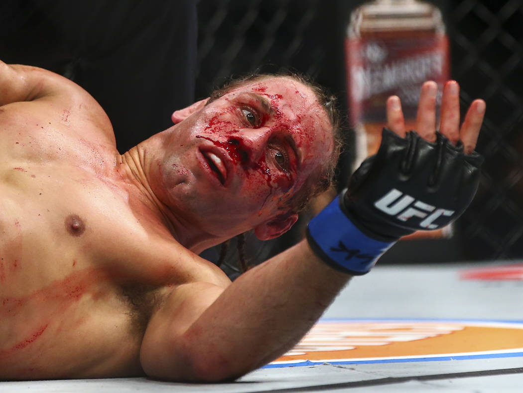 Urijah Faber looks on during his fight against Petr Yan in their bantamweight bout in UFC 245 a ...