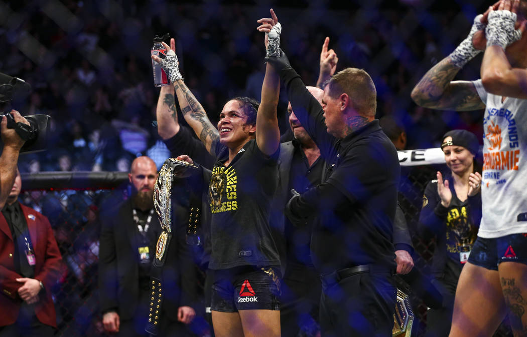 Amanda Nunes celebrates her unanimous decision win against Germaine de Randamie in their bantam ...