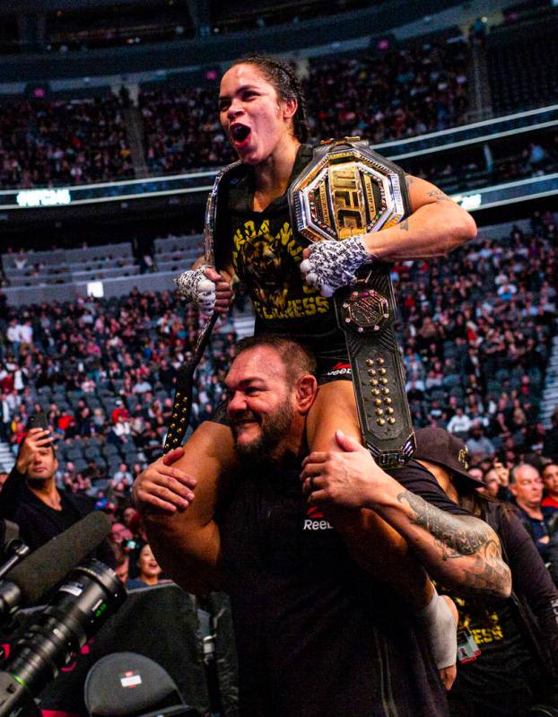 Amanda Nunes celebrates her unanimous decision win against Germaine de Randamie in their bantam ...