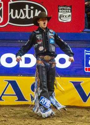 Zeke Thurston of Big Valley, Alberta, is pumped up after riding Kitty Whistle in Saddle Bronc R ...