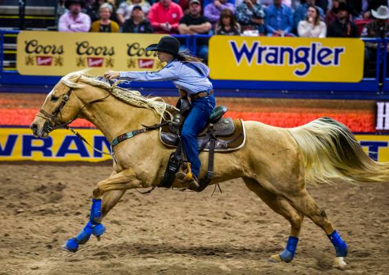 Hailey Kinsel of Cotulla, Texas, heads for home in Barrel Racing at the tenth go round of the W ...
