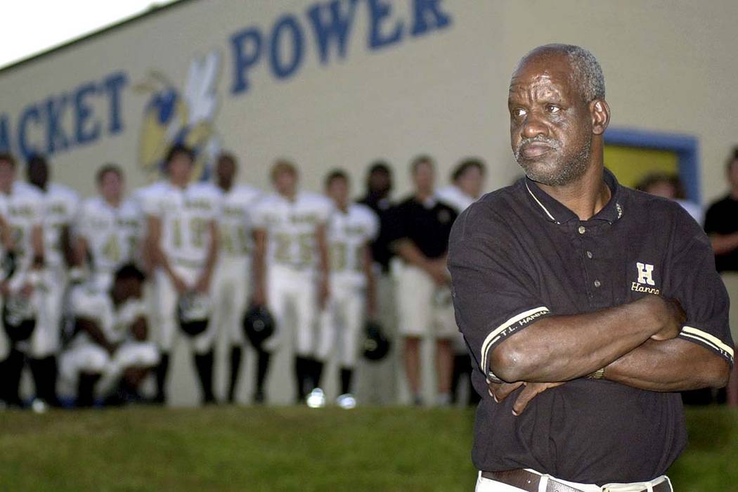 In this Sept. 19, 2003 file photo James "Radio" Kennedy stands with the T.L. Hanna High School ...