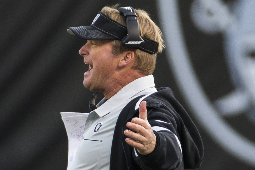 Oakland Raiders head coach Jon Gruden argues a call in the fourth quarter during an NFL footbal ...