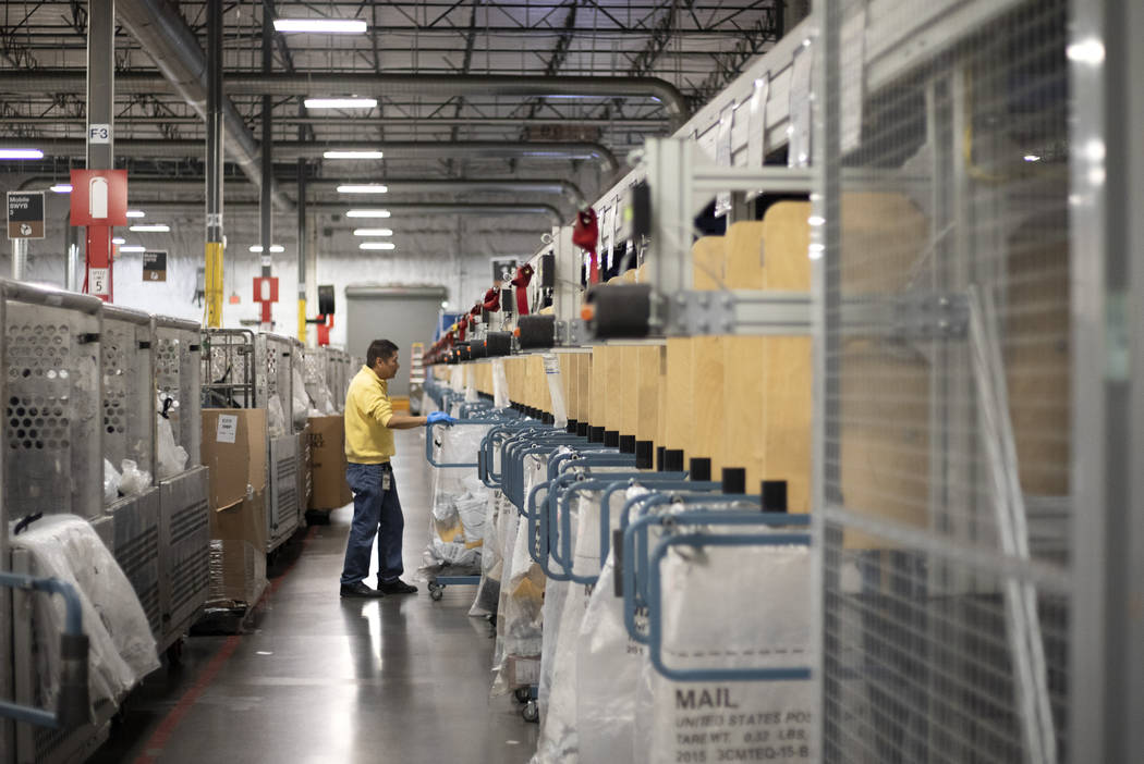 The USPS Mail Processing Annex is busy ahead of the holiday season on Thursday, Dec. 12, 2019. ...