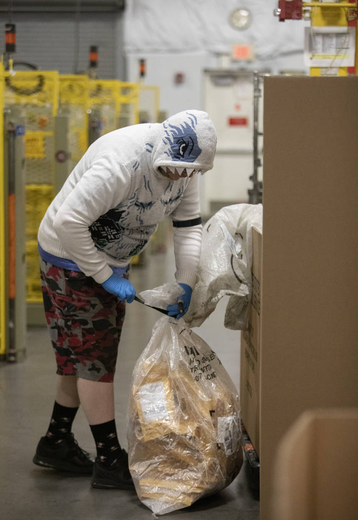 Joshua Robinson of Las Vegas wears a "Bumble" sweater, the abominable snowman from th ...