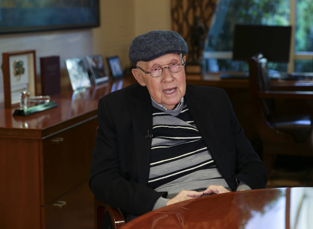 Former Nevada Sen. Harry Reid talks to a reporter in his office at the Bellagio in Las Vegas Mo ...