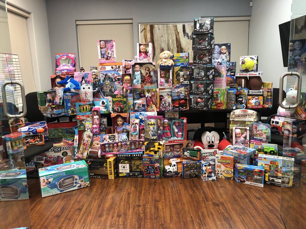 Frank Napoli II led Berkshire Hathaway Home Services' seventh annual toy drive for foster child ...