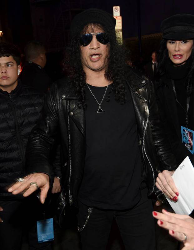 Slash arrives at the world premiere of "Star Wars: The Rise of Skywalker" on Monday, ...