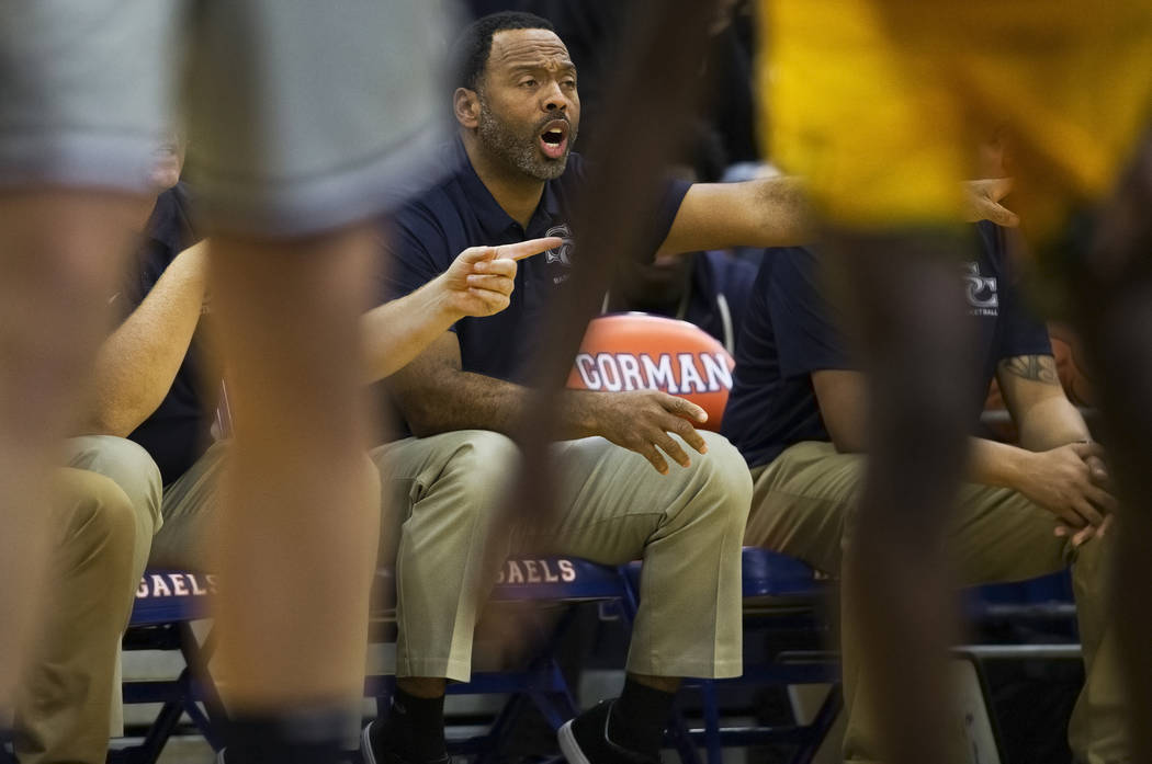 Sierra Canyon head coach Andre Chevalier coaches up his team in the second half during their ga ...