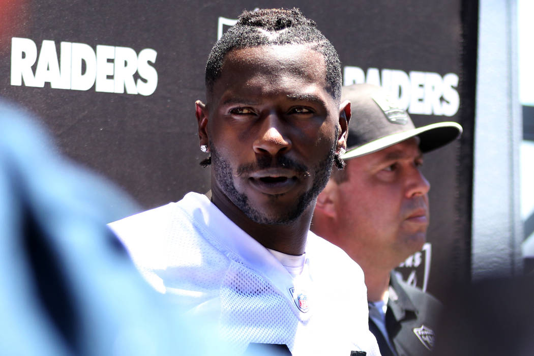 Oakland Raiders wide receiver Antonio Brown (84) answers questions during a press conference af ...