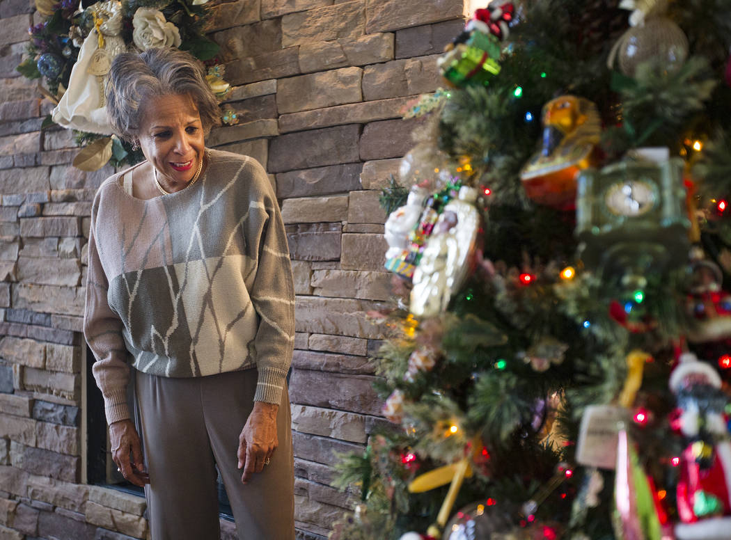 Roxanne Givens looks over her Christmas tree at her home in Las Vegas, Wednesday, Dec. 18, 2019 ...