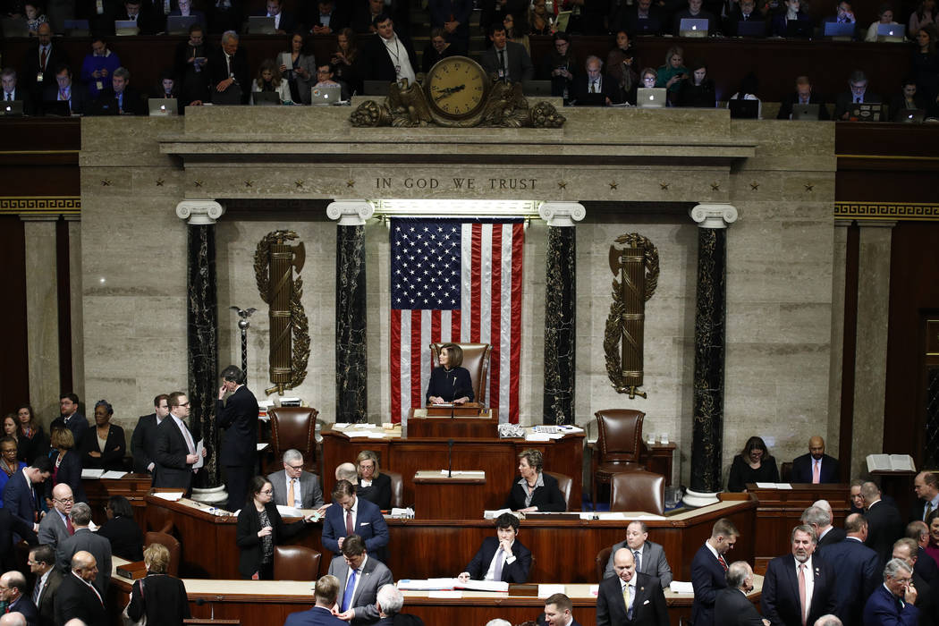 House Speaker Nancy Pelosi of Calif., speaks during a vote on the articles of impeachment again ...