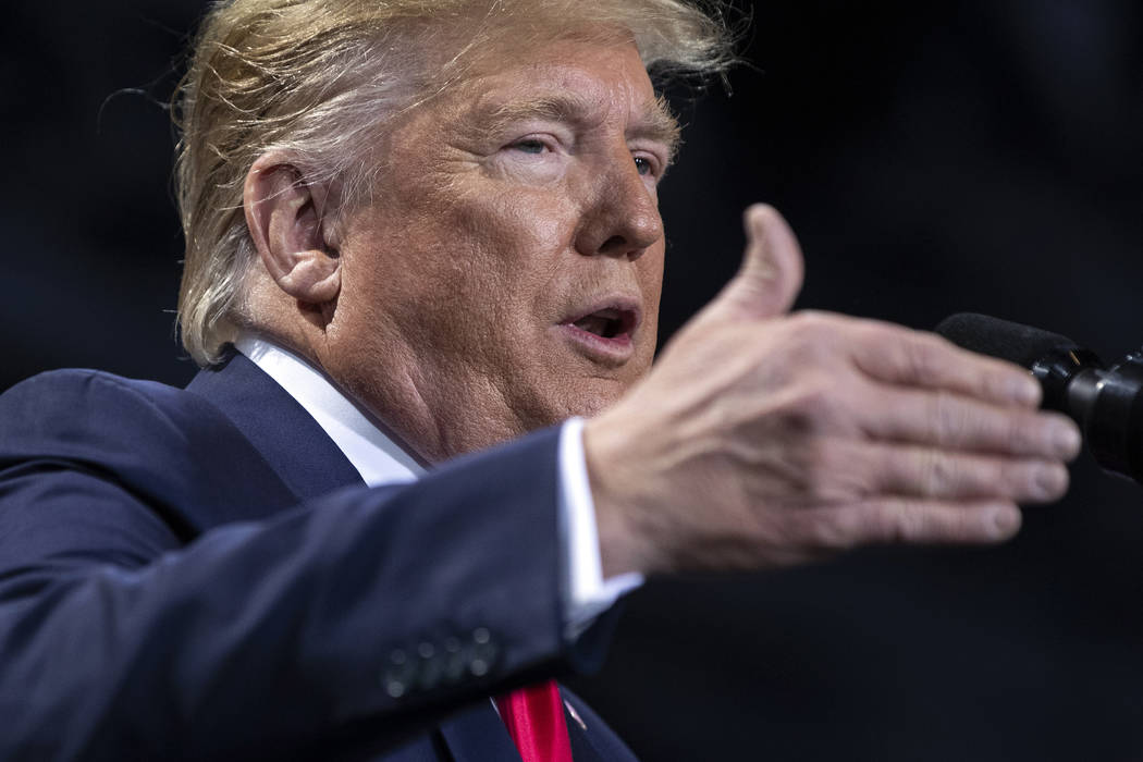 President Donald Trump speaks during a campaign rally at Kellogg Arena, Wednesday, Dec. 18, 201 ...