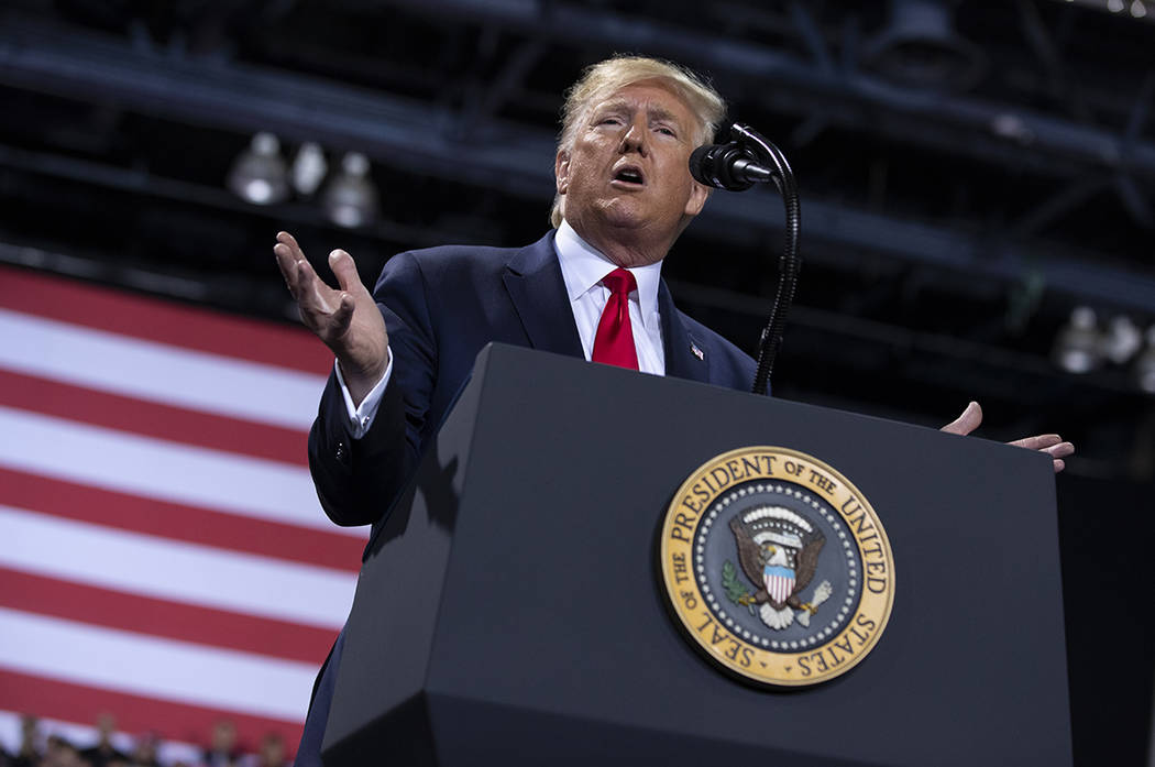 President Donald Trump speaks during a campaign rally at Kellogg Arena, Wednesday, Dec. 18, 201 ...