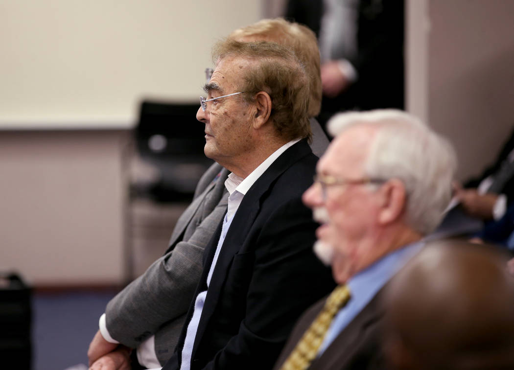 Phil Ruffin, left, waits to appear before Nevada Gaming Commission at the Sawyer Building in La ...