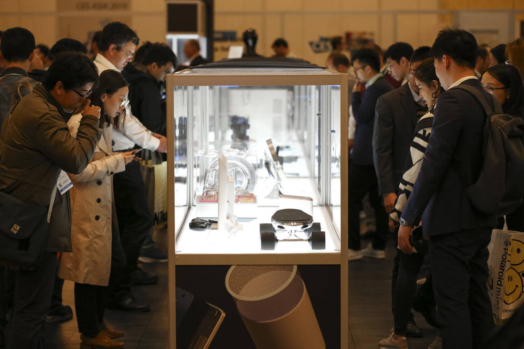 Attendees browse over the Best of Innovation and Honoree products on display at the Innovations ...