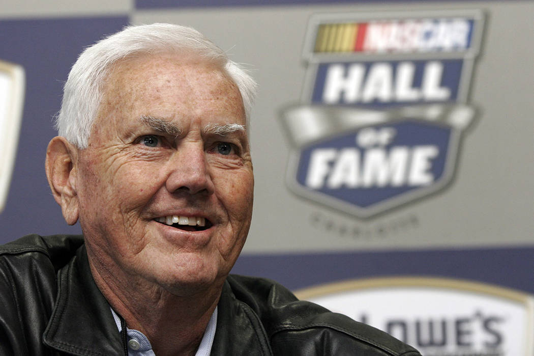 Former NASCAR driver and owner Junior Johnson smiles as he speaks to media about being named to ...