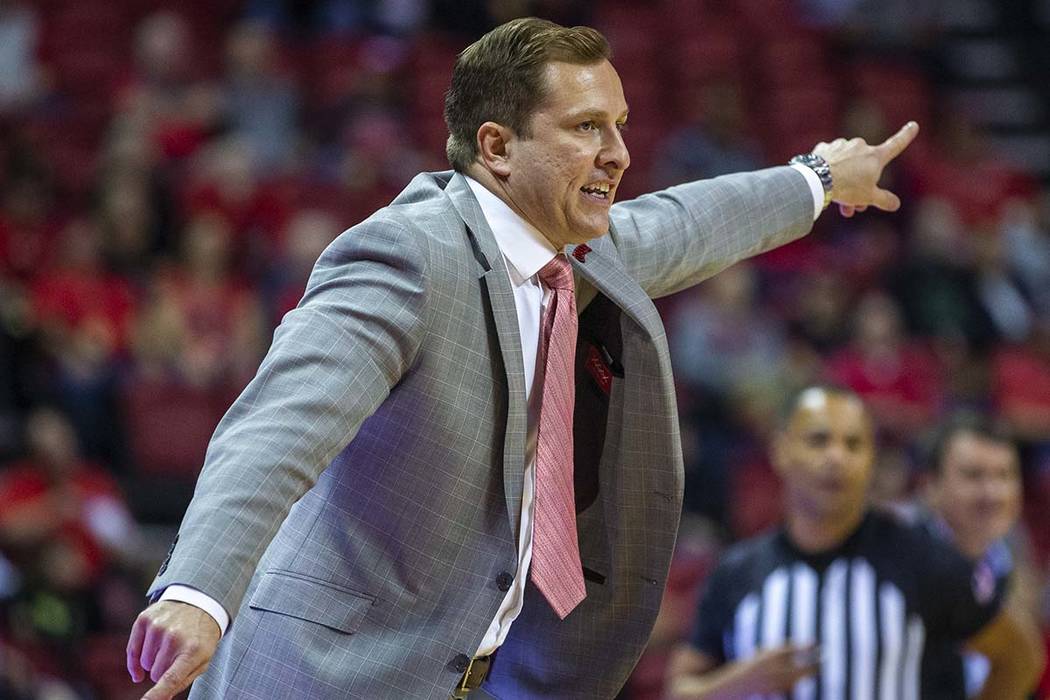 UNLV Rebels head coach T.J.Otzelberger directs his defense versus the Abilene Christian Wildcat ...