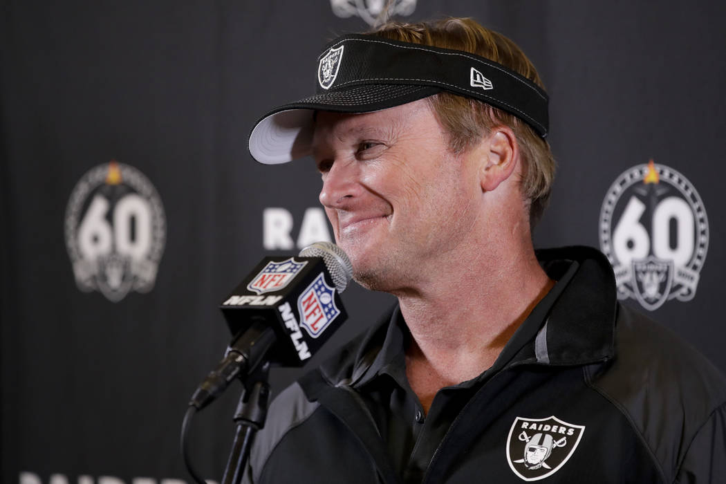 Oakland Raiders head coach Jon Gruden speaks during a news conference after an NFL football gam ...