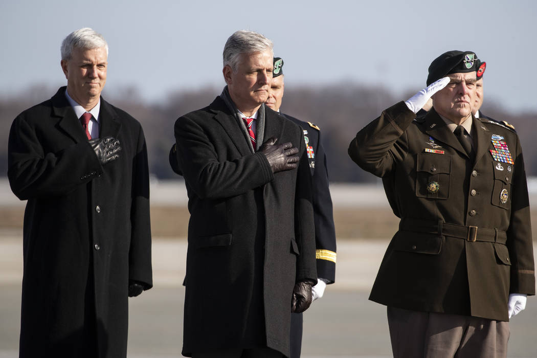 Acting Under Secretary of the Army James McPherson, left, National Security Adviser Robert O'Br ...