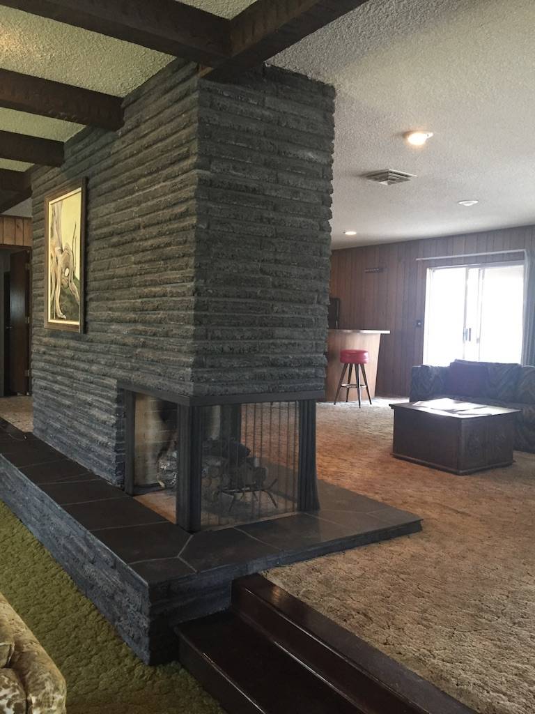 BEFORE: The fireplace was kept. (Jon Sparer)