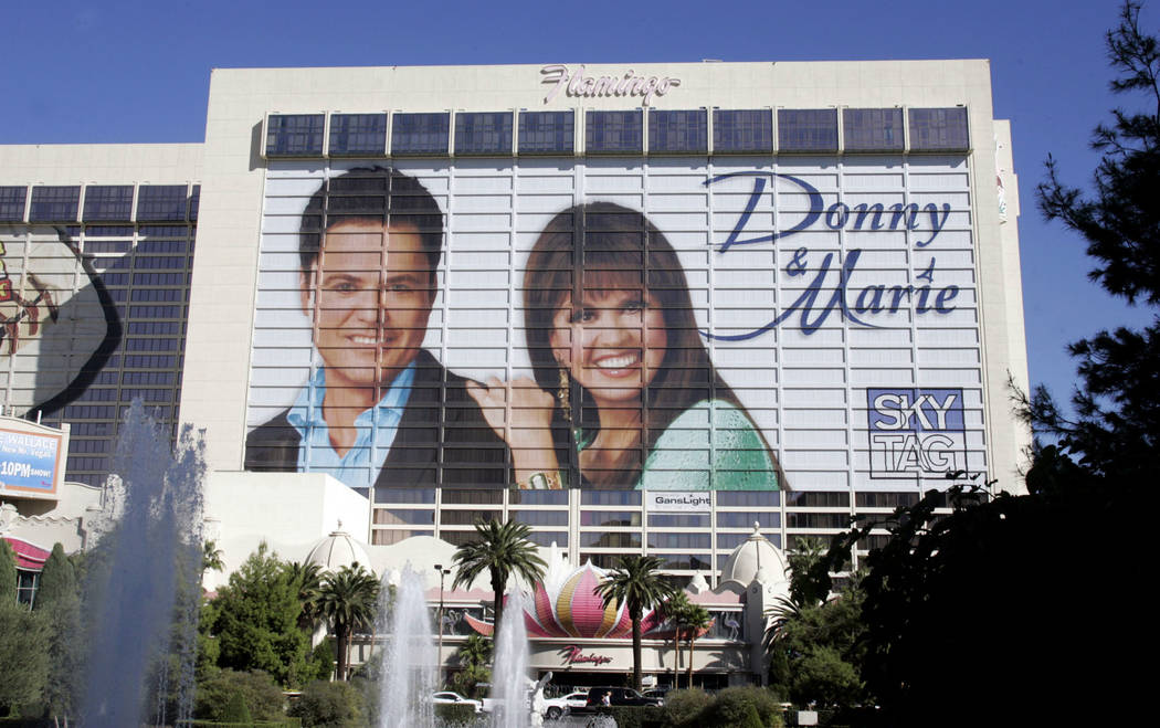 In this Oct. 20, 2008, file photo, performers Donny Osmond and his sister Marie Osmond are show ...