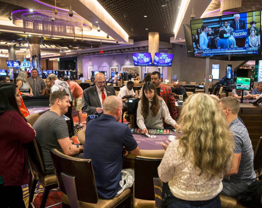 Gamblers play blackjack at SLS Las Vegas on Thursday, May, 30, 2019, in Las Vegas. (Benjamin Ha ...