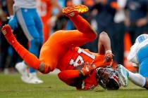 Denver Broncos wide receiver Courtland Sutton (14) is tackled by Detroit Lions cornerback Dariu ...