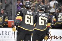 Vegas Golden Knights right wing Mark Stone (61) and left wing Max Pacioretty skate together aga ...