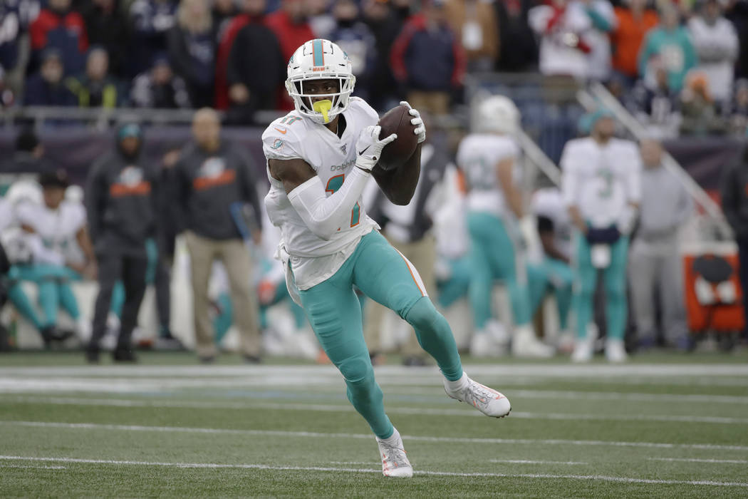 Miami Dolphins wide receiver DeVante Parker runs after catching a pass in the second half of an ...
