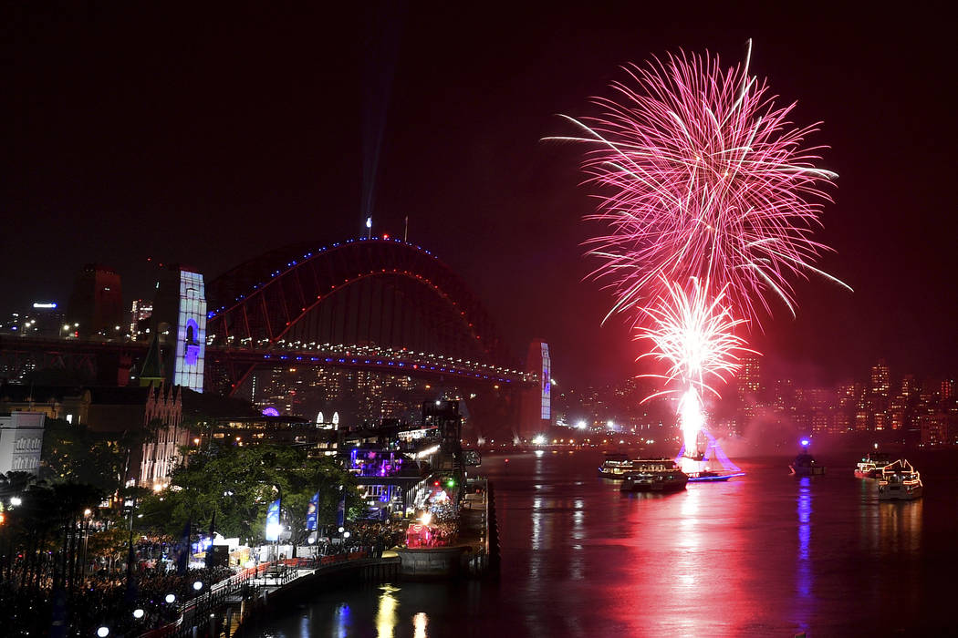 The 9pm family fireworks explode over the Sydney Opera House and Sydney Harbour Bridge on Sydne ...