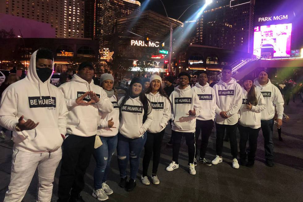 A group wearing "Be Humble" sweatshirts on Las Vegas Boulevard near the Park Theater. ...