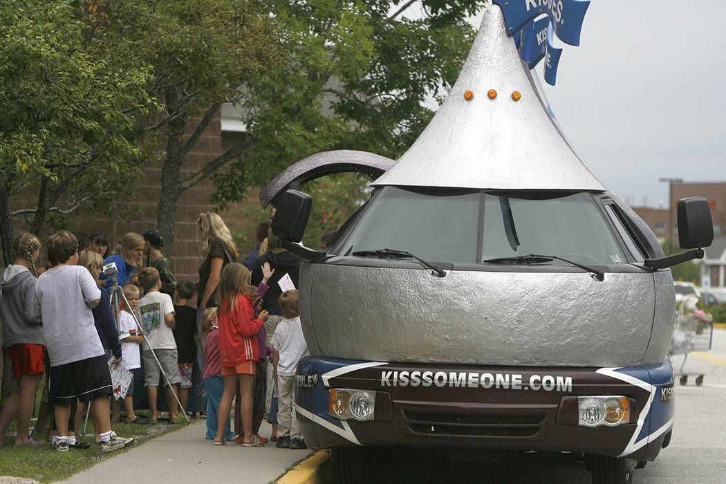 FILE - In a Wednesday, Aug. 15, 2007 file photo, youngsters line up to see the Hershey's Kissmo ...