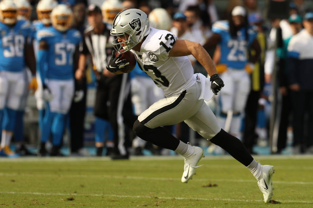 Oakland Raiders wide receiver Hunter Renfrow (13) breaks loose and heads to the end zone during ...