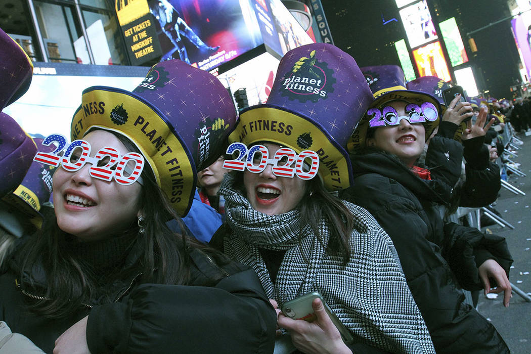 Revelers, including Natsumi Ishikawa, left, and Minori Kondo, second from left, both from Nagoy ...