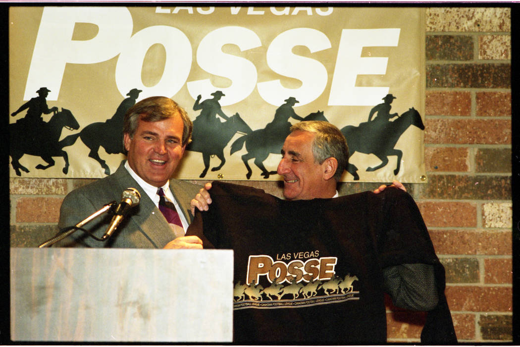 Former National Football League and UNLV football coach Ron Meyer (left) officially joins the L ...