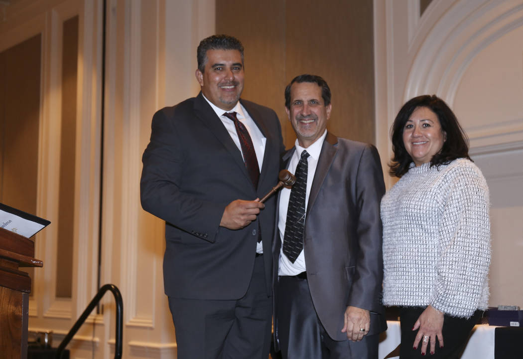 Carlos Zuluagua, left, of Pardee Homes has been named board president of HomeAid Southern Nevad ...