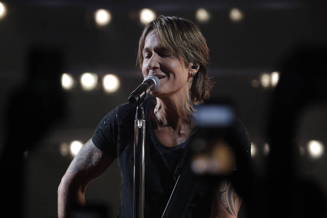 Keith Urban performs "We Were" at the CMT Music Awards on Wednesday, June 5, 2019, at ...