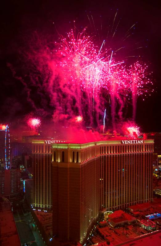 Fireworks light up the sky above The Venetian on the Strip on Wednesday, Jan. 1, 2020, in Las V ...