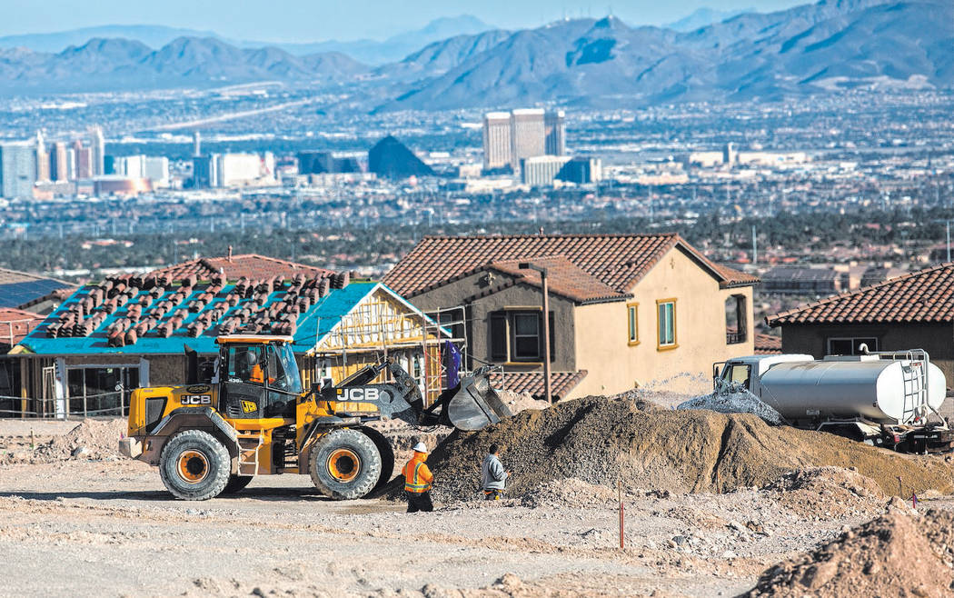Benjamin Hager/Las Vegas Review-Journal This file photo shows construction workers preparing an ...