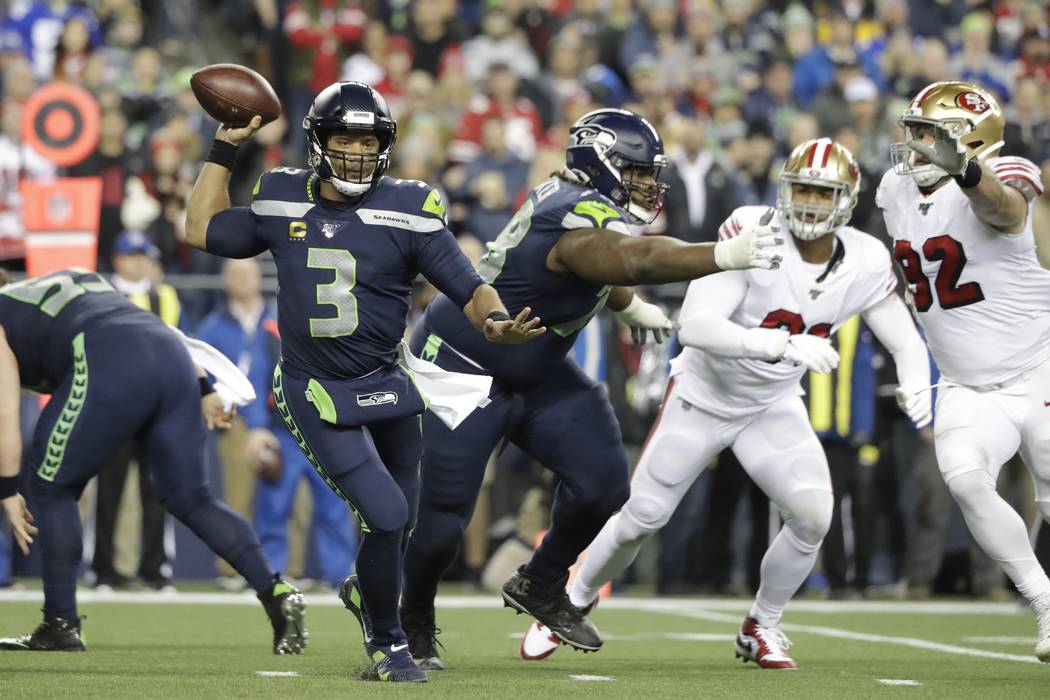 Seattle Seahawks quarterback Russell Wilson in action against the San Francisco 49ers during th ...