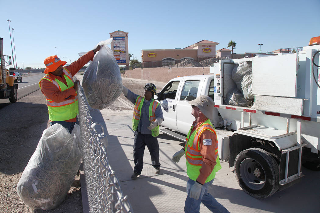 A Nevada Department of Transportation crew works to clean up debris. (Courtesy NDOT)