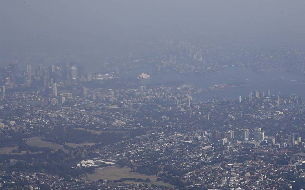 Bushfire smoke shrouds the skyline of Australia's largest city Sydney, Saturday, Jan. 4, 2020. ...